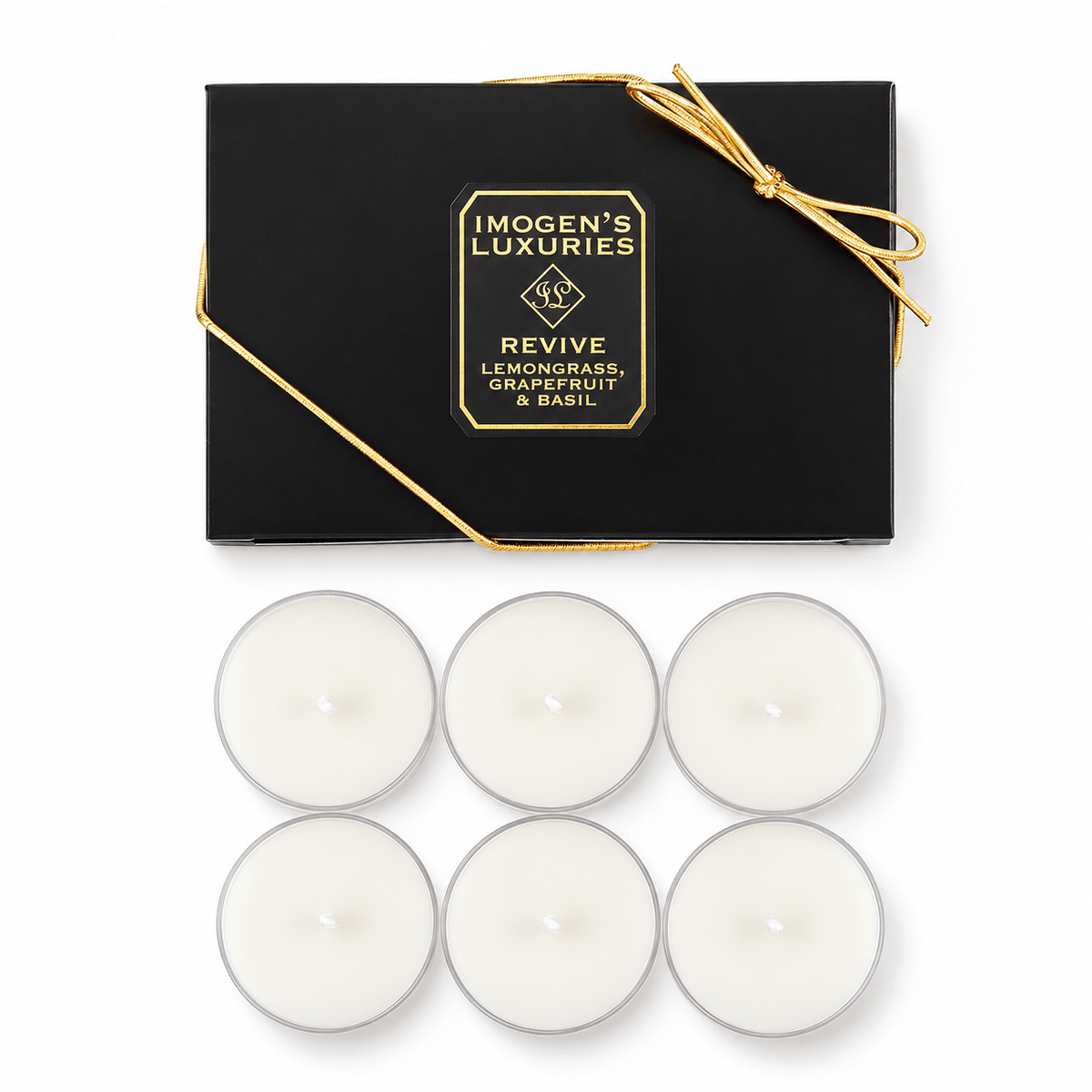 Six white tea light candles arranged below their black gift box with gold lettering and a gold bow, on a white background. The box reads 'IMOGEN'S LUXURIES' 'REVIVE - LEMONGRASS, GRAPEFRUIT & BASIL'.