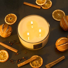Luxury Christmas scented 3 wick soy wax candle. Scented with pure Orange, Cinnamon, Clove and Ginger Essential Oils. All Natural, vegan and cruelty free.  Free from Paraffin and all synthetic ingredients. No additives. 500g wax weight.