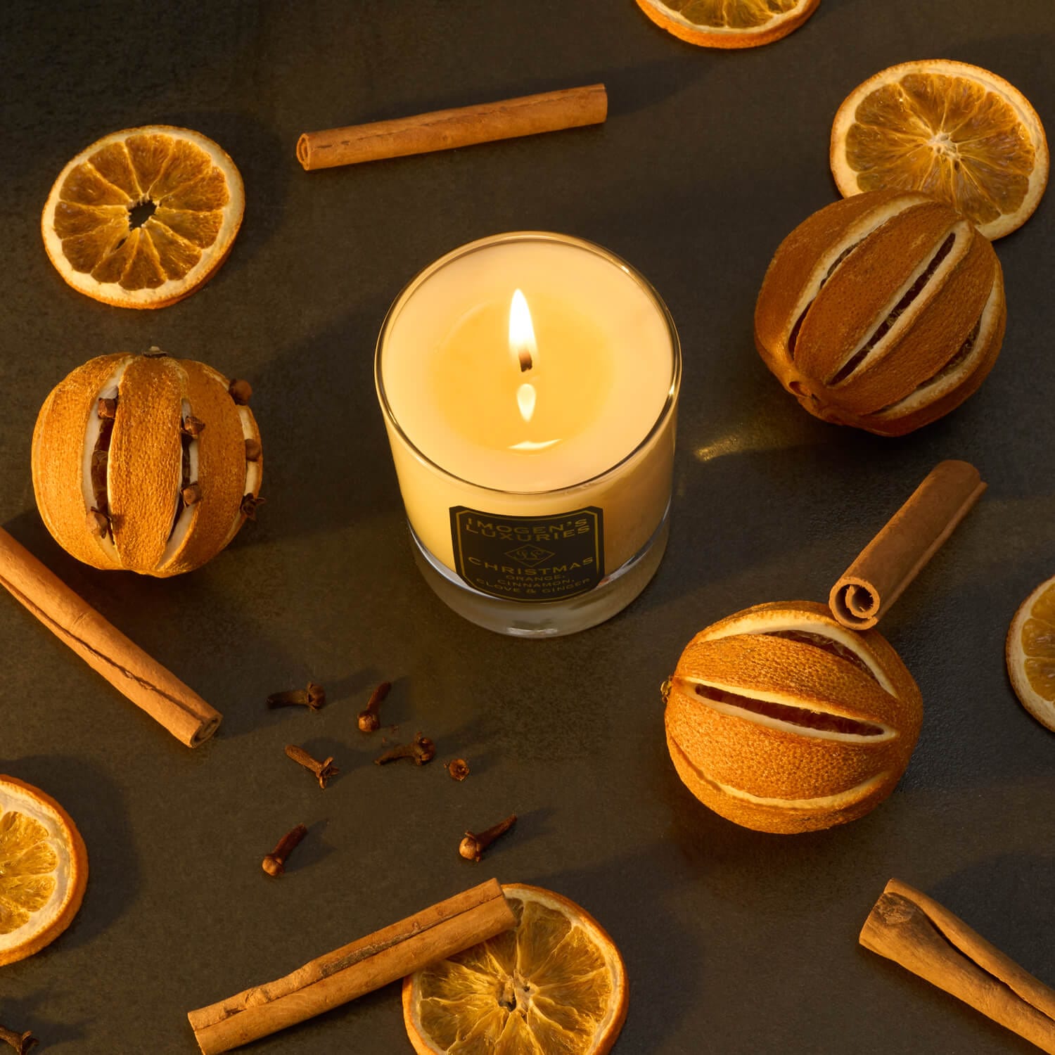 Luxury Christmas soy wax candle highly scented with our award winning blend of Orange, Cinnamon, Clove and Ginger Essential Oils. Handmade in Berkshire by Imogen's Luxuries, natural, vegan and cruelty free.