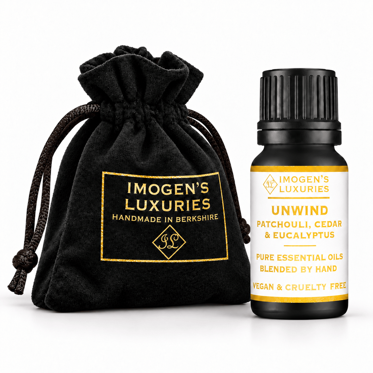Concentrated Unwind Essential Oil blend, Patchouli, Cedarwood & Eucalyptus. Shown in black 10ml bottle with white and gold label saying "Unwind". Bottle sits next to a luxury black velvet pouch with gold lettering saying "IMOGEN'S LUXURIES HANDMADE IN BERKSHIRE"