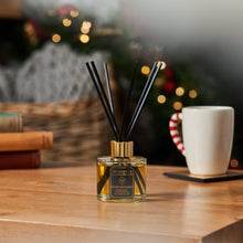 Christmas reed diffuser is scented with natural Orange, Cinnamon, Clove and Ginger essential Oils. Natural, vegan and cruelty free. Long lasting fragrance for a festive atmosphere 100ml. Handmade in Berkshire by Imogen's Luxuries