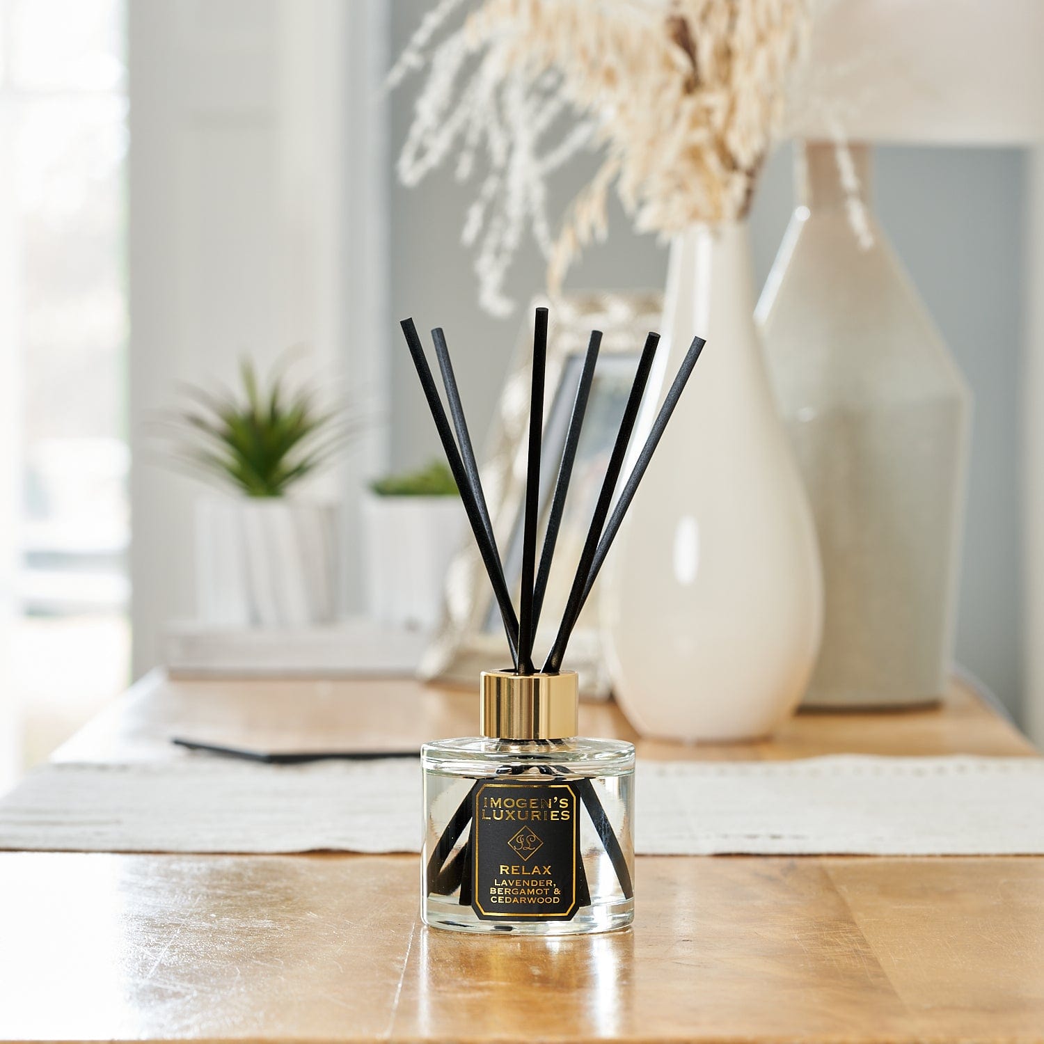 Imogen’s Luxuries Relax reed diffuser is scented with our signature Relaxing blend of Lavender, Bergamot & Cedar Essential Oils. Harnessing the aromatherapy properties of the essential oils our relax diffuser is an effortless way to transform your home into your sanctuary. Simply place in your room of choice and enjoy this calming scent. Handmade in Berkshire, England. Natural, vegan and cruelty free