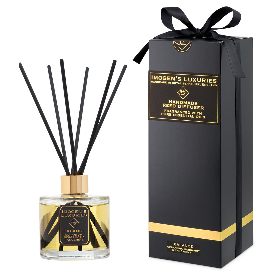 Luxury Balance 200ml large reed diffuser is scented with natural Geranium, Bergamot & Tangerine Essential Oils. Includes thick black reeds and black & gold gift box with satin bow. Handmade by Imogen’s Luxuries, Berkshire, England.
