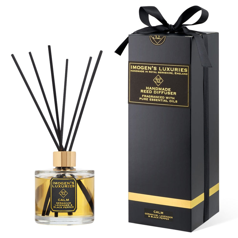 Luxury Calm 200ml large reed diffuser is scented with natural Geranium, Lavender & Black Pepper Essential Oils. Includes thick black reeds and black & gold gift box with satin bow. Handmade by Imogen’s Luxuries, Berkshire, England.