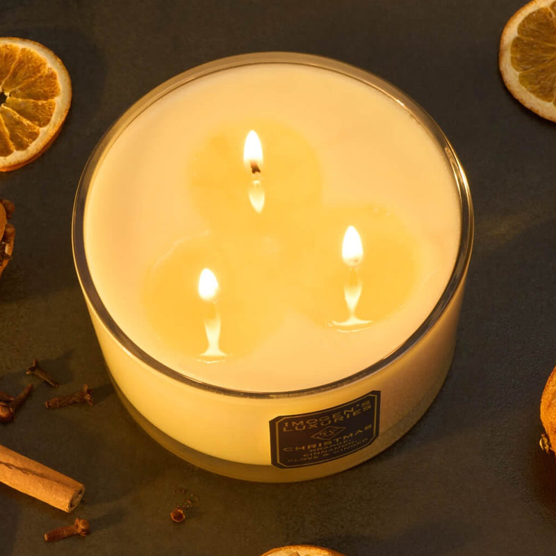 Luxury 3 wick Christmas natural wax candle. Highly scented with award winning blend of Orange, Cinnamon, Clove and Ginger essential oils. All-natural and paraffin free. Handmade by Imogen's Luxuries, Berkshire.