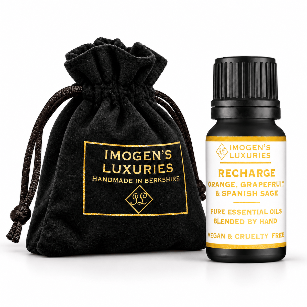 Concentrated Recharge Essential Oil blend, Orange, Grapefruit & Spanish Sage. Shown in black 10ml bottle with white and gold label saying "Recharge". Bottle sits next to a luxury black velvet pouch with gold lettering saying "IMOGEN'S LUXURIES HANDMADE IN BERKSHIRE"