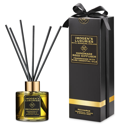 Recharge luxury aromatherapy reed diffuser with Grapefruit, Orange and Spanish Sage Essential Oils. Uplifting and energising. Natural, vegan and cruelty free. Beautiful black and gold gift box containing 1 100ml Recharge reed diffuser with 6 thick black reeds. Handmade in small batches by Imogen's Luxuries, Berkshire. £18.00