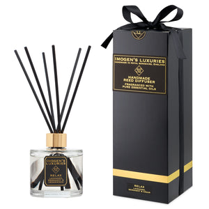 Luxury Relax 200ml reed diffuser is scented with natural Lavender, Bergamot & Cedar Essential Oils. Includes thick black reeds and black & gold gift box with satin bow. Handmade by Imogen’s Luxuries, Berkshire, England.
