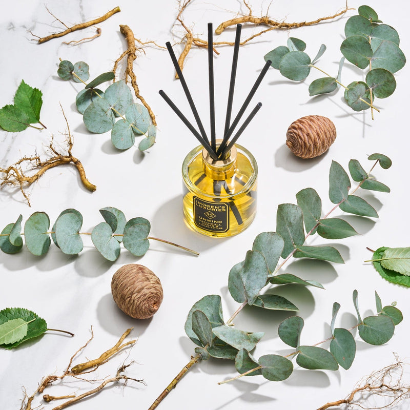 Unwind is a sumptuous and masculine blend of Patchouli, Cedar and Eucalyptus essential oils. Long lasting our Unwind reed diffuser is 100ml and includes 6 thick black reeds. Available with or without gift box. Handmade by Imogen's Luxuries, Berkshire, England 