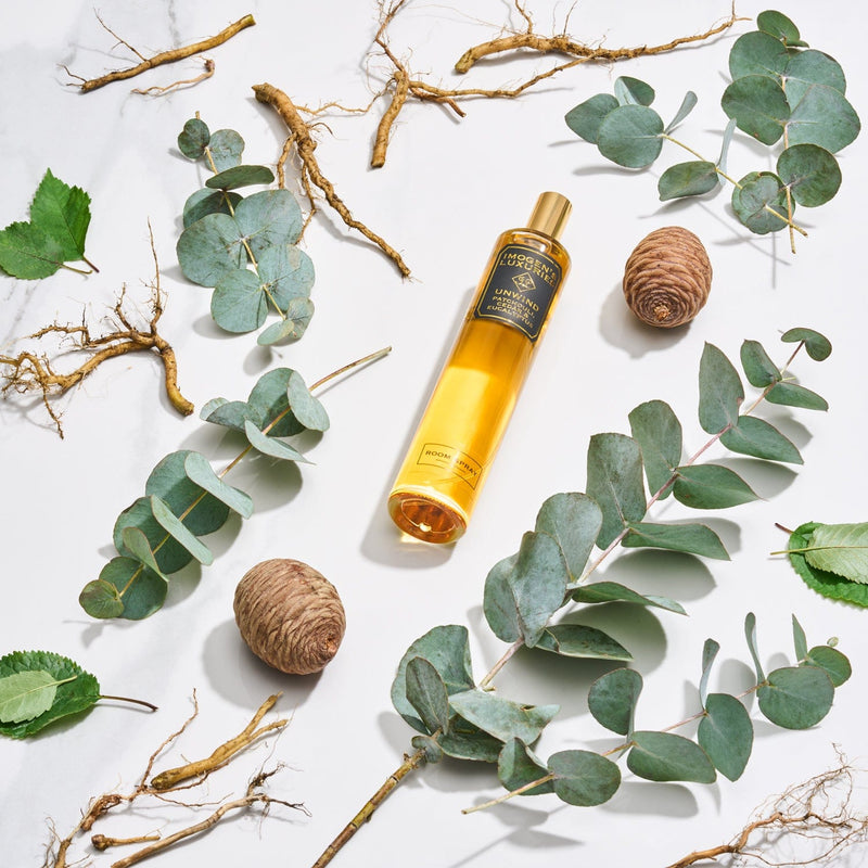 Unwind room spray is generously scented with Patchouli, Cedar and Eucalyptus essential oils. Masculine and sumptuous woody scent. Handmade Imogen's Luxuries Berkshire England. Large 100ml size in glass bottle with perfume atomiser to create a fine scented mist