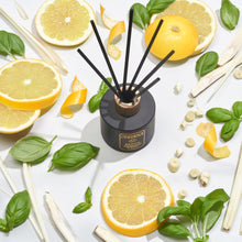 Revive black reed diffuser is highly scented with Lemongrass, Grapefruit & Basil essential oils. Handmade in Berkshire and presented in a matte black bottle with 6 thick black reeds and a black and gold label. Imogen's Luxuries. Vegan and cruelty free