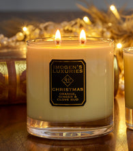 Christmas Home Candle burning. 325g Soy wax fragranced with Orange, Cinnamon, Clove andGinger Essential oils. Handmade in England by a mother and daughter team.