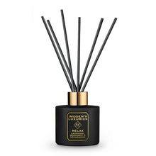 Relax black reed diffuser is presented in our beautiful matte black bottle with a stunning gold collar, thick black reeds and with our signature black and gold label.  Scented with our calming and relaxing aromatherapy blend of Lavender, Bergamot and Cedar essential oils. Handmade in Berkshire with all natural ingredients.