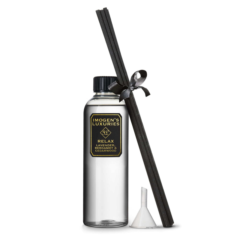Relax Reed Diffuser refill set is a large 200ml bottle with 6 thick black reeds. Scented with our signature blend of Lavender, Bergamot & Cedar essential oils.  An environmentally friendly and cost effective way to make your diffuser last longer.  Perfume your home naturally with this calming and relaxing fragrance. Vegan, cruelty free and handmade in Berkshire by Imogen's Luxuries