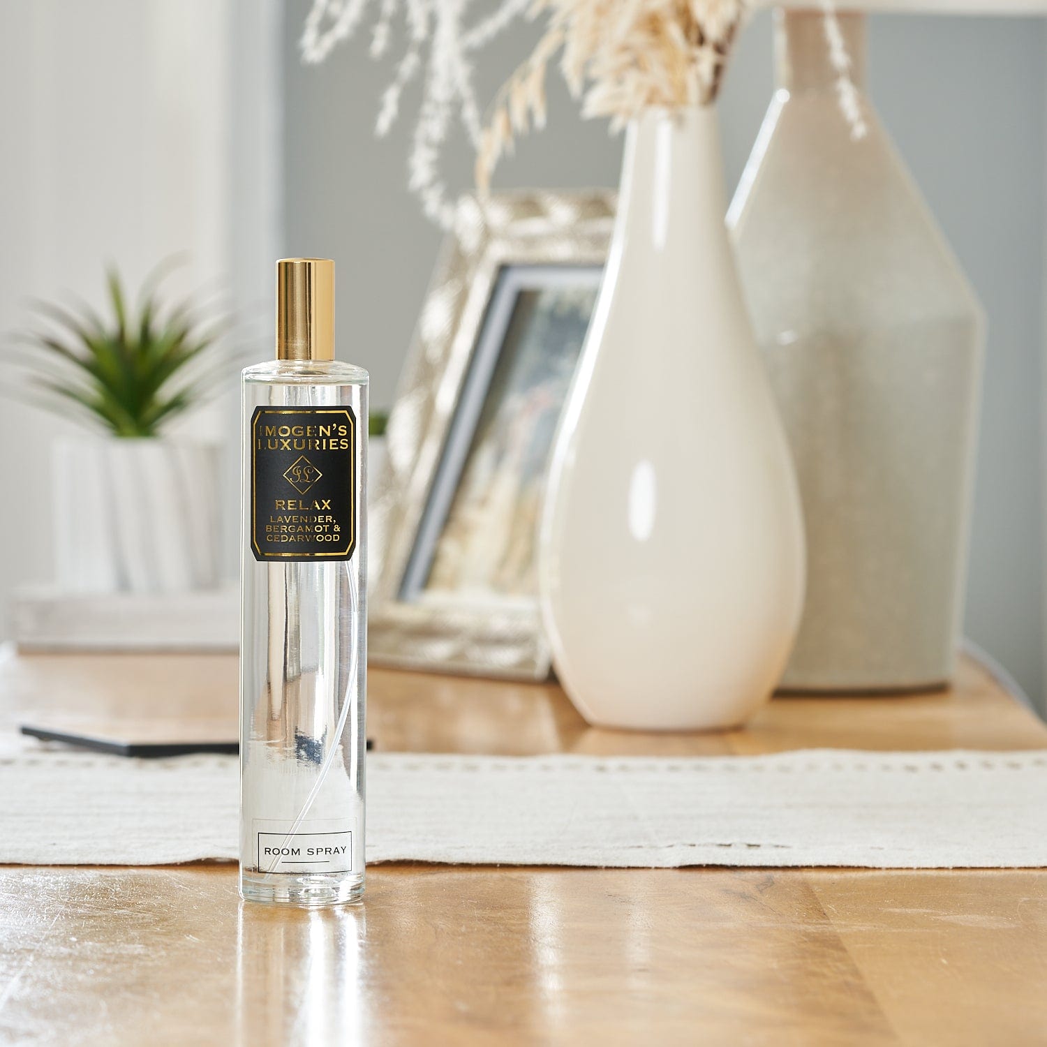 Our Relax room spray will enhance any living space with it's elegant presentation and relaxing fragrance. Handmade and scented with pure essential oils of Lavender, Bergamot and Cedar, it is a wonderful perfume for your home. Instil inner harmony and create a lasting impression with our long lasting Relax room spray. Handmade by Imogen's Luxuries, Berkshire, England in small batches. Vegan and cruelty free