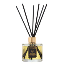 Revive luxury reed diffuser by Imogen's Luxuries, featuring a premium glass bottle with 100% pure essential oils of Lemongrass, Grapefruit & Basil. Hand-poured in Berkshire with high-performance black fibre reeds for long-lasting natural aromatherapy.