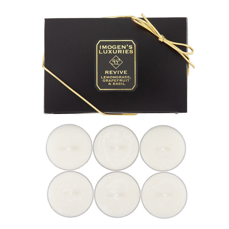 Pack of 6 Revive aromatherapy natural wax tea lights in a gift box. Highly scented with Lemongrass, Grapefruit and Basil Essential Oils. Hand poured in recyclable cups by Imogen’s Luxuries Berkshire, England