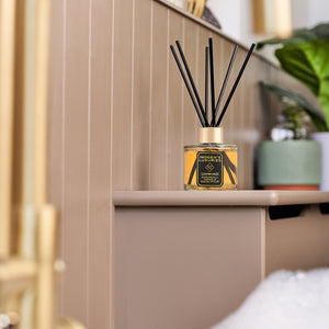 Our Unwind 100 ml Reed diffuser is scented with Patchouli, Cedar & Eucalyptus essential oils. Natural, vegan and cruelty free. Great to keep your bathroom scented with this woody masculine blend
