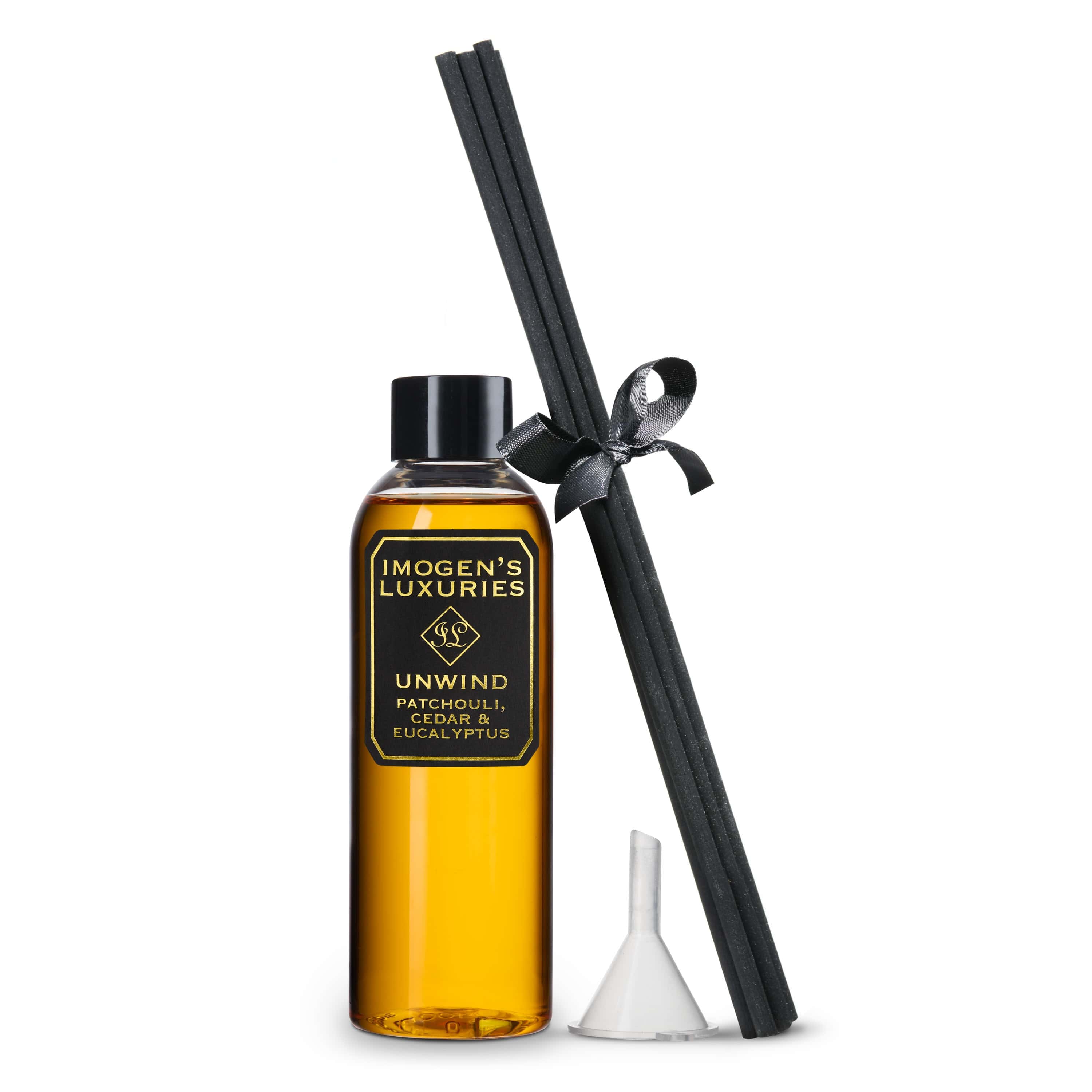 Unwind 100ml reed diffuser refill scented with pure Patchouli, Cedar and Eucalyptus essential oils. Includes 6 thick black reeds and a funnel. Natural, vegan and cruelty free.
