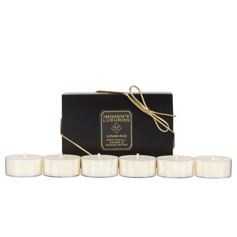 Pack of 6 Unwind natural wax tea lights fragranced with Patchouli, Cedar and Eucalyptus Essential Oils £7.00 