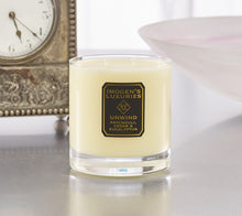Unwind Home Candle: Fragranced with Patchouli, Cedar & Eucalyptus Essential Oils. Handpoured with 320g natural wax. £24.00. Free Standard UK delivery.