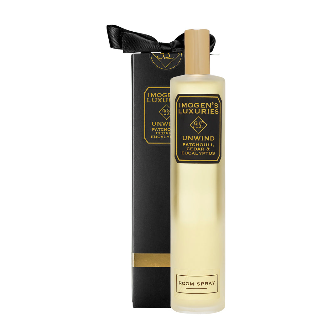 Unwind Room Spray: Fragranced with Patchouli, Cedar & Eucalyptus essential oils. Long lasting fragrance with strong masculine scent. 100ml glass bottle with gold perfume atomiser to create a fine mist of home perfume. Beautiful black and gold gift box finished with a satin bow. £16 Handmade by Imogen's Luxuries, Berkshire, England.