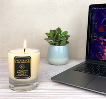 Burning our Unwind candle can help reduce stress during working. Patchouli, Cedar and Eucalyptus essential oils help to restore a sense of calm and help focus. Handmade with natural wax by Imogen's Luxuries, Berkshire. UK